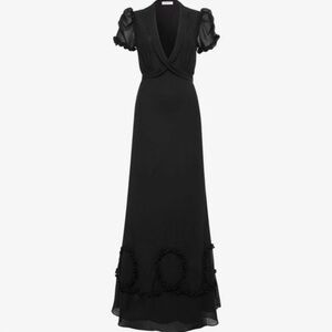 Rumored black formal dress with puff sleeve